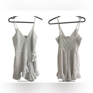 Sugar+Lips Elegant White Lace Faux Wrap Lace Romper.